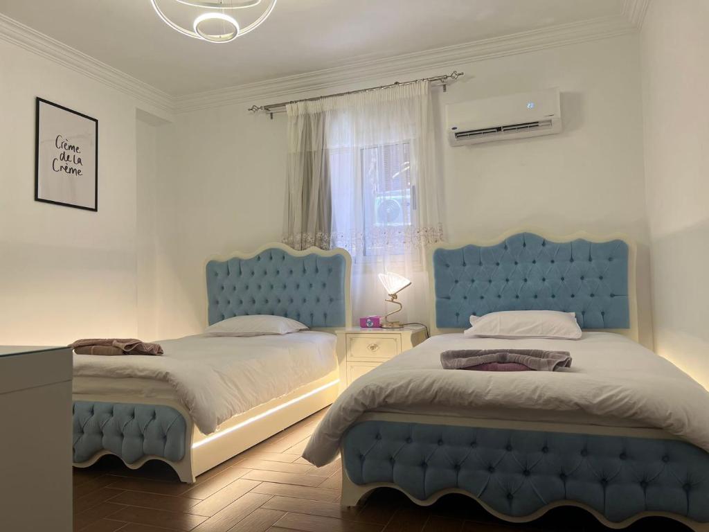 Postel nebo postele na pokoji v ubytování oasis guest house