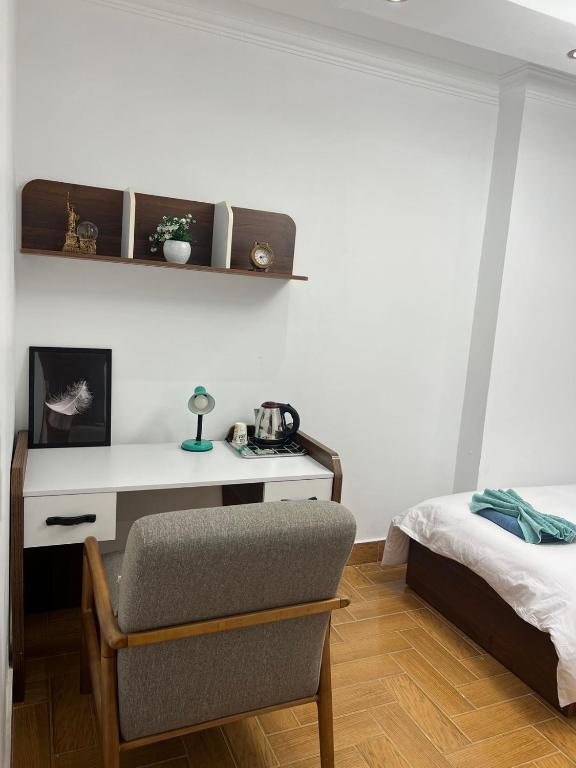 Postel nebo postele na pokoji v ubytování oasis guest house