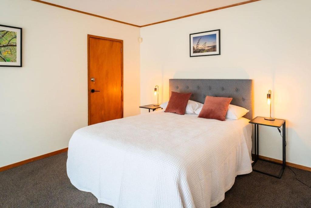 Letto o letti in una camera di Chapman House Auckland