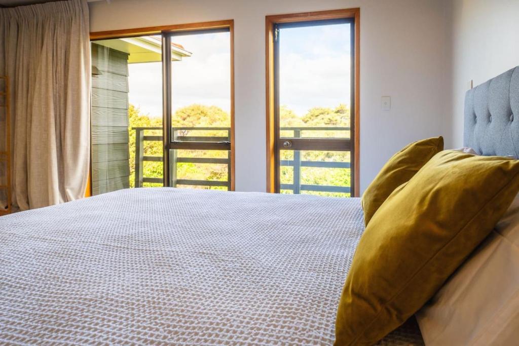 Letto o letti in una camera di Chapman House Auckland