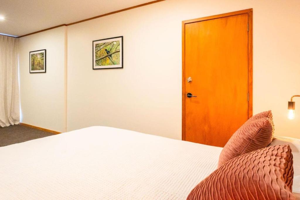 Letto o letti in una camera di Chapman House Auckland