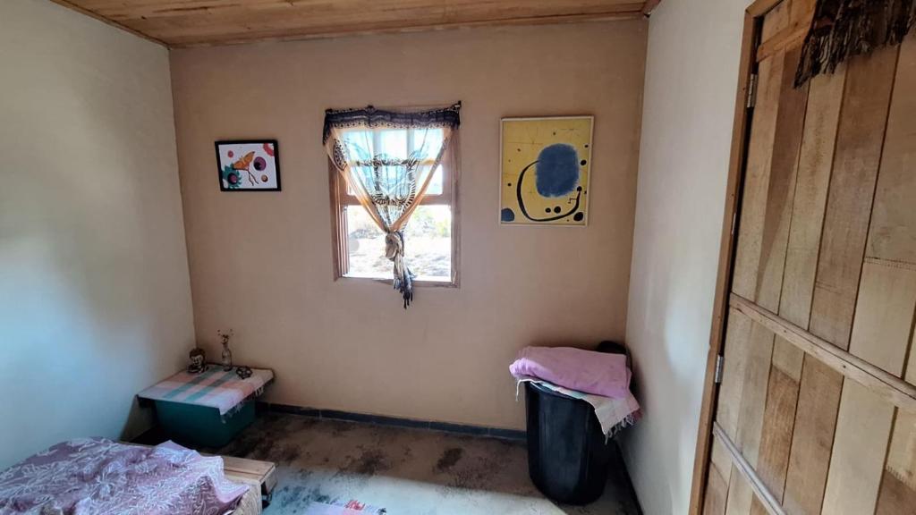 Postel nebo postele na pokoji v ubytování Casa Donjá