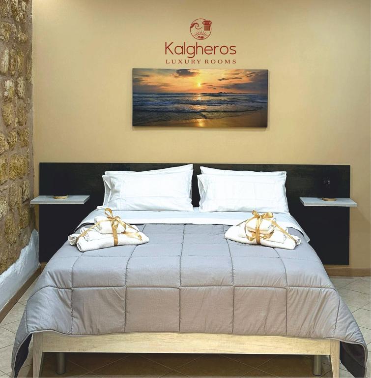 Postel nebo postele na pokoji v ubytování KALGHEROS Luxury Rooms