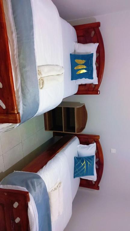 Postel nebo postele na pokoji v ubytování Remboya apartments