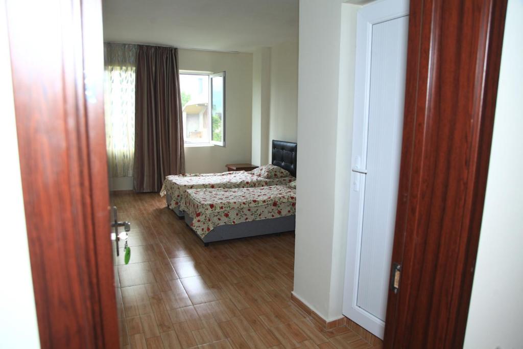 Postel nebo postele na pokoji v ubytování Batumi Hotel