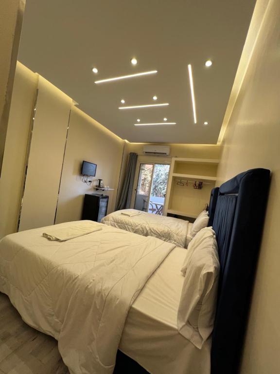 Letto o letti in una camera di Moses Pyramids Inn