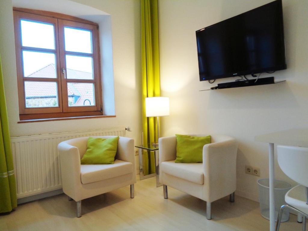 TV a/nebo společenská místnost v ubytování Hotel Apartment Puell