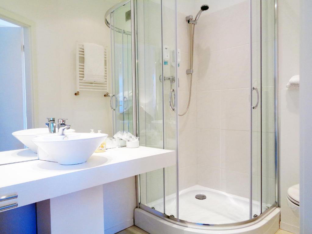 Koupelna v ubytování Hotel Apartment Puell