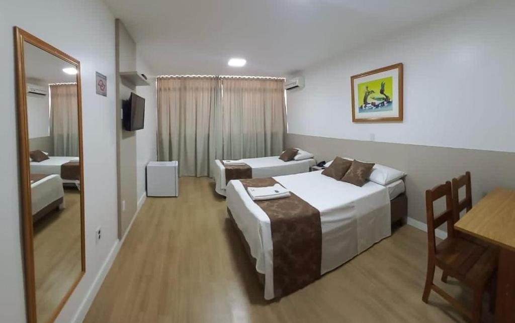 Postel nebo postele na pokoji v ubytování Max Hotel