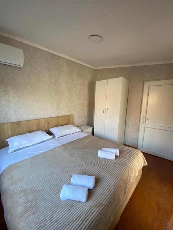 Postel nebo postele na pokoji v ubytování Hotel Doko
