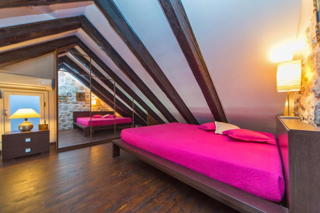 Postel nebo postele na pokoji v ubytování Dubravka Apartment