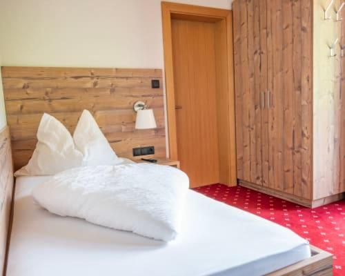 Postel nebo postele na pokoji v ubytování Pichlerhof