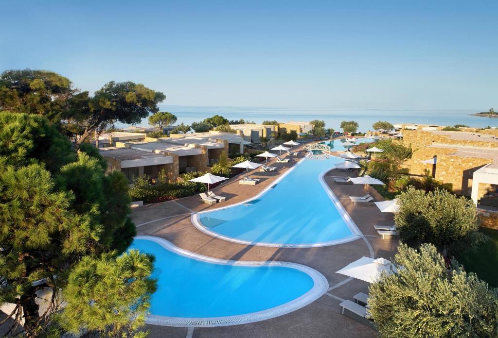 The swimming pool at or close to Ikos Olivia