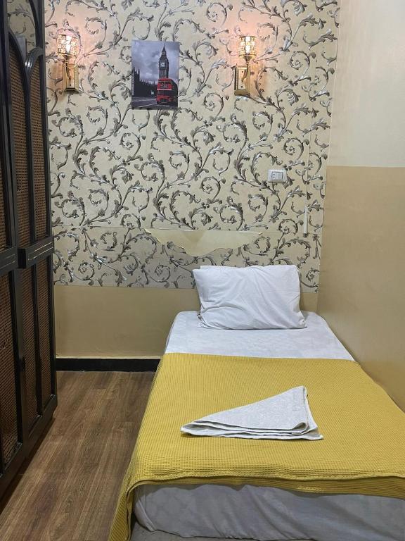 Postel nebo postele na pokoji v ubytování One Season Hotel
