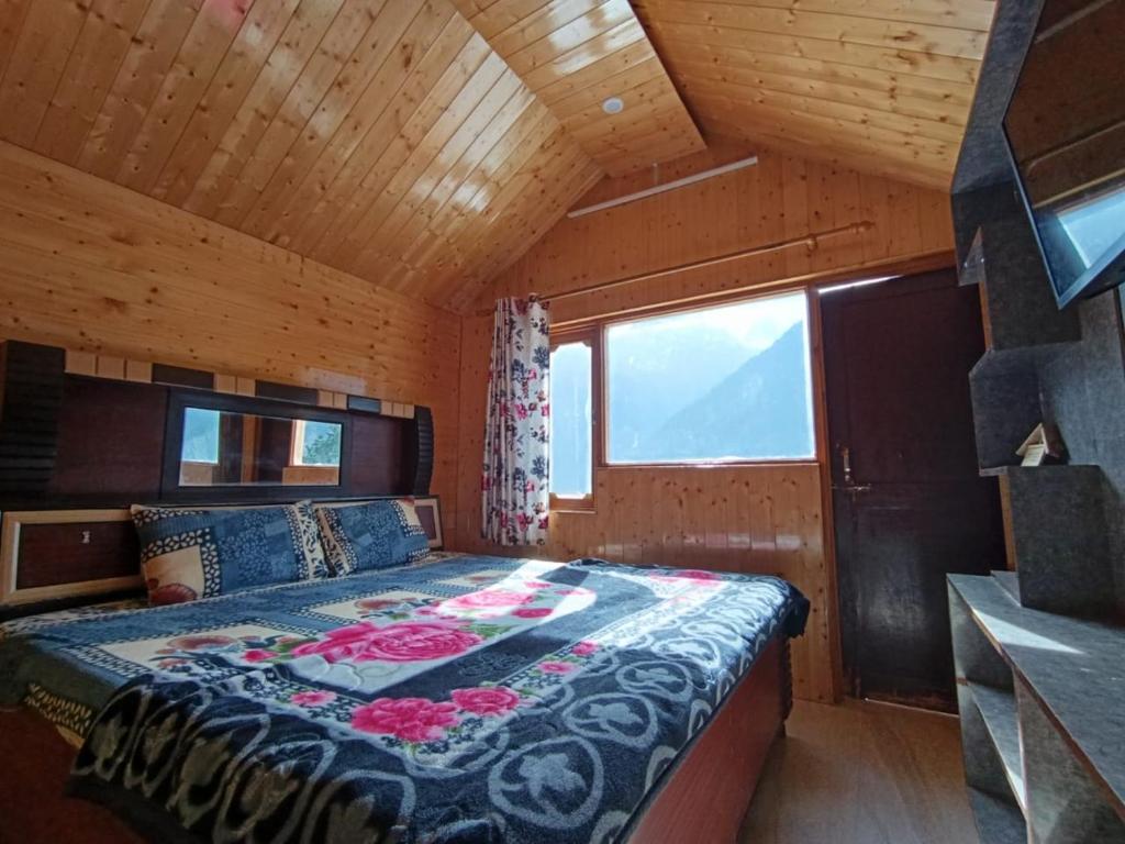 Postel nebo postele na pokoji v ubytování The Shudarang Inn