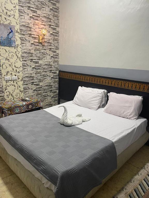 Postel nebo postele na pokoji v ubytování One Season Hotel
