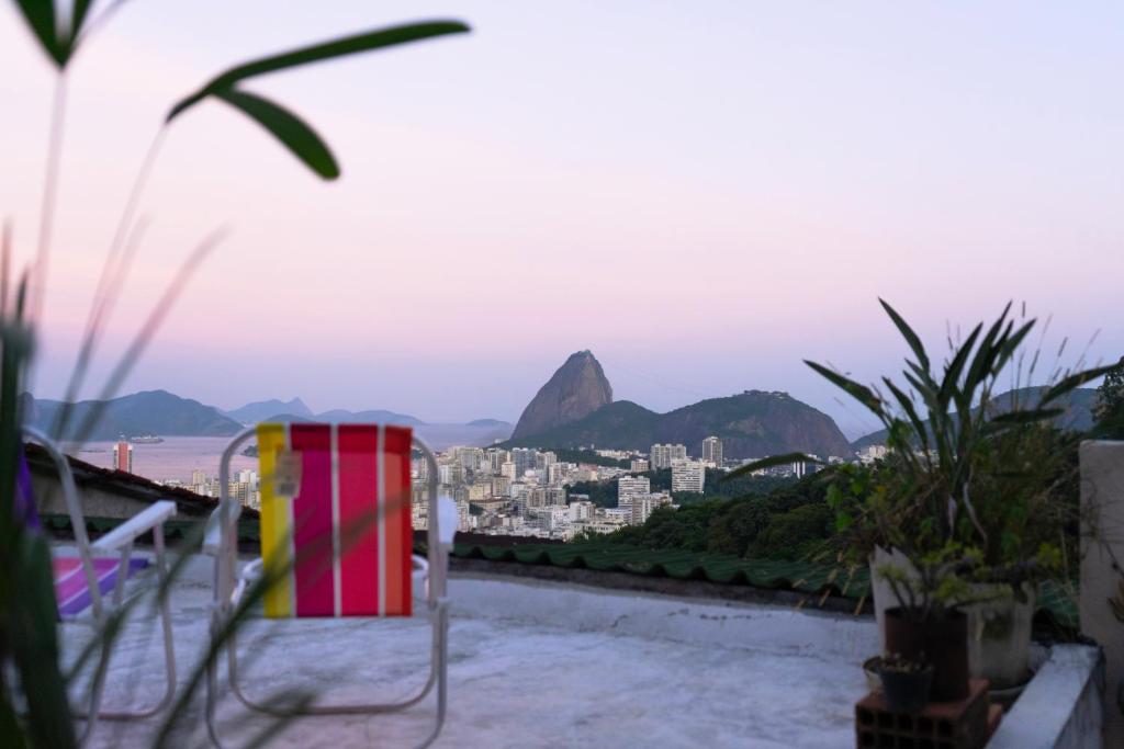 a view of the city from the roof of a building at La Bohème Casa Cultural - Santa Teresa in Rio de Janeiro