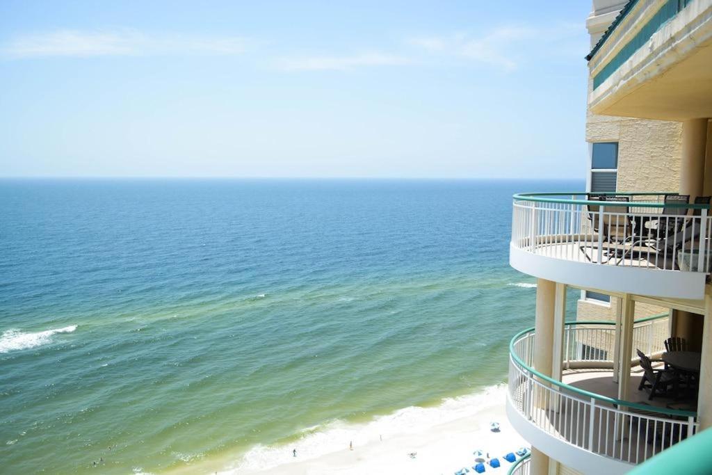 a view of the ocean from the balcony of a building at Beach Colony 18A in Pensacola