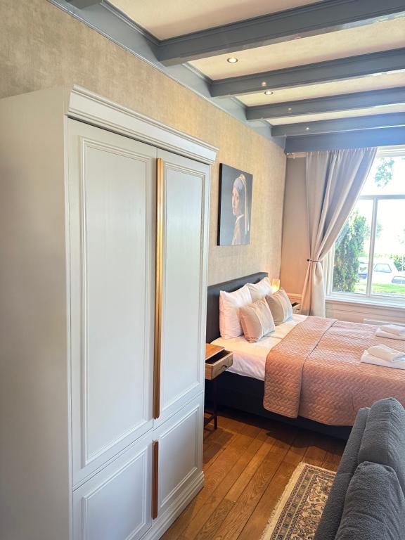 Postel nebo postele na pokoji v ubytování De Stadshoeve
