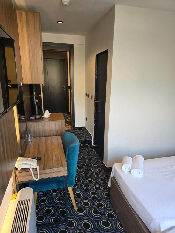 Postel nebo postele na pokoji v ubytování Hotel Carpe Diem