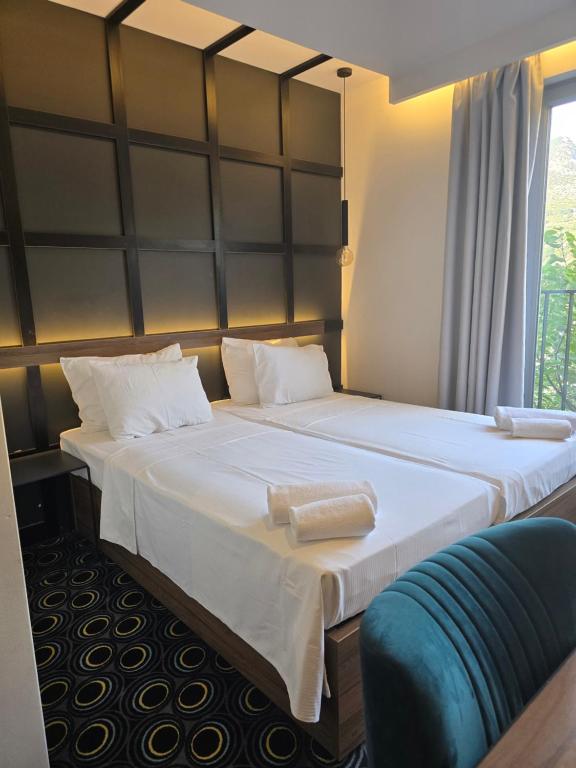 Postel nebo postele na pokoji v ubytování Hotel Carpe Diem