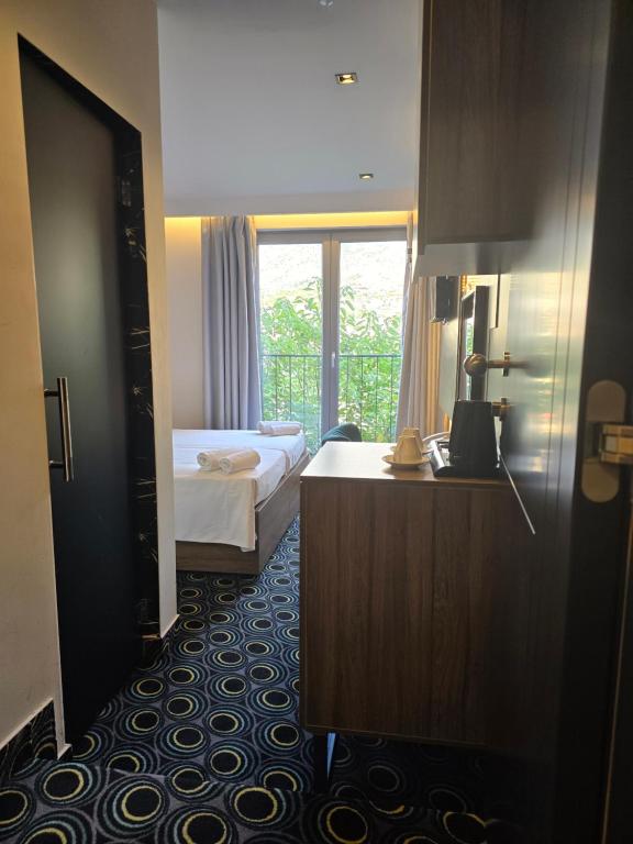 Postel nebo postele na pokoji v ubytování Hotel Carpe Diem