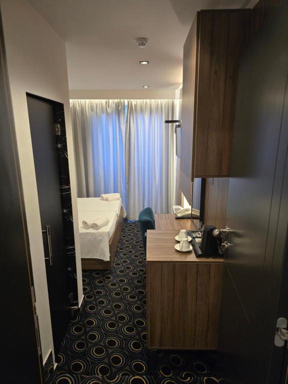 Kuchyň nebo kuchyňský kout v ubytování Hotel Carpe Diem