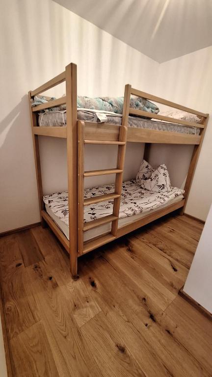 Postel nebo postele na pokoji v ubytování Rooms Dreisiebner at the Heart