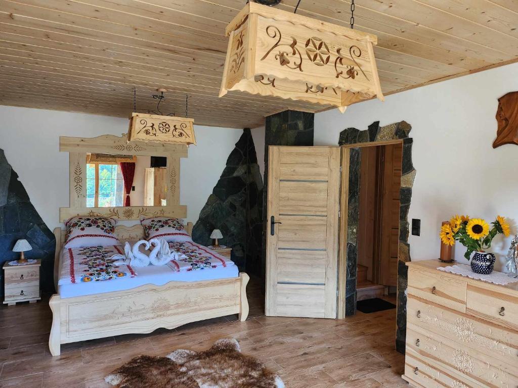 Postel nebo postele na pokoji v ubytování Chata Trzy Wierchy