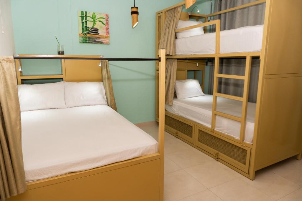 Postel nebo postele na pokoji v ubytování Hostal Las Guaduas
