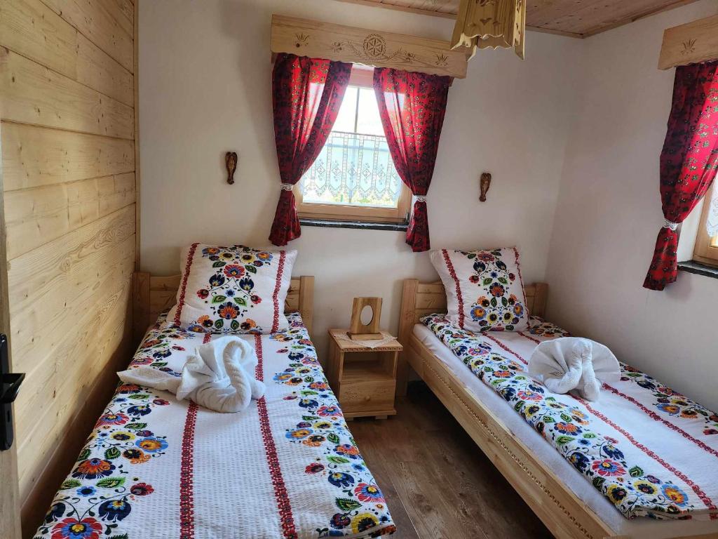 Postel nebo postele na pokoji v ubytování Chata Trzy Wierchy
