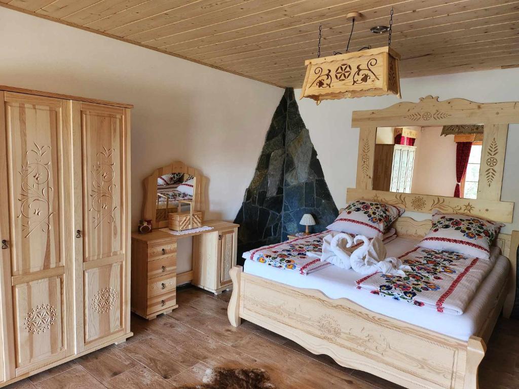 Postel nebo postele na pokoji v ubytování Chata Trzy Wierchy
