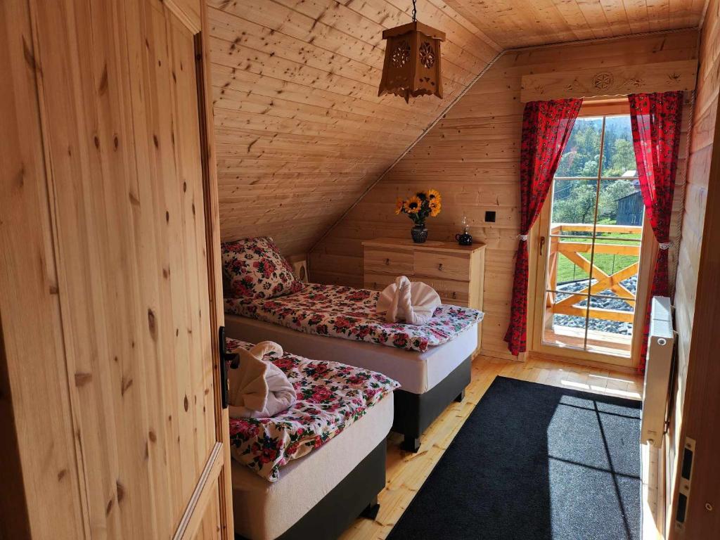 Postel nebo postele na pokoji v ubytování Chata Trzy Wierchy