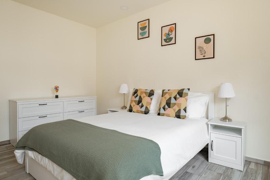 En eller flere senge i et værelse på Polanco Prime Location Suites - Near Citibanamex