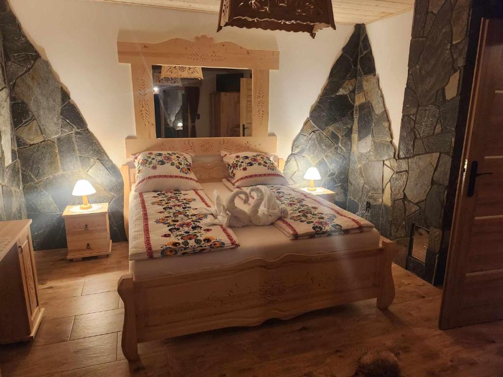 Postel nebo postele na pokoji v ubytování Chata Trzy Wierchy