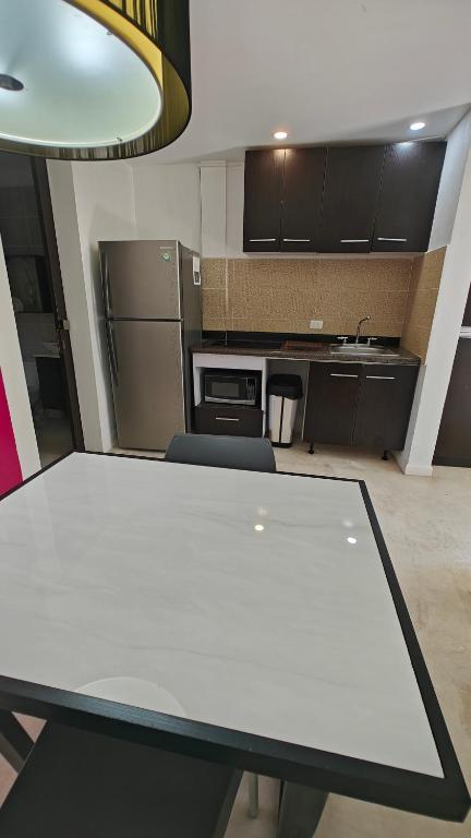 Kuchyň nebo kuchyňský kout v ubytování Tu Departamento en Mahahual