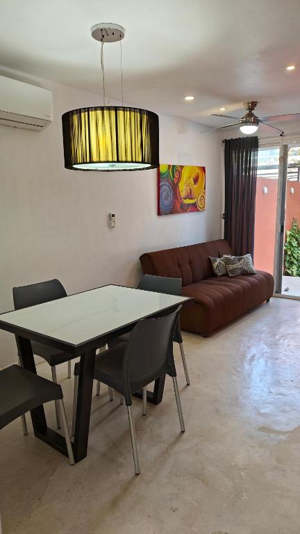 Posezení v ubytování Tu Departamento en Mahahual