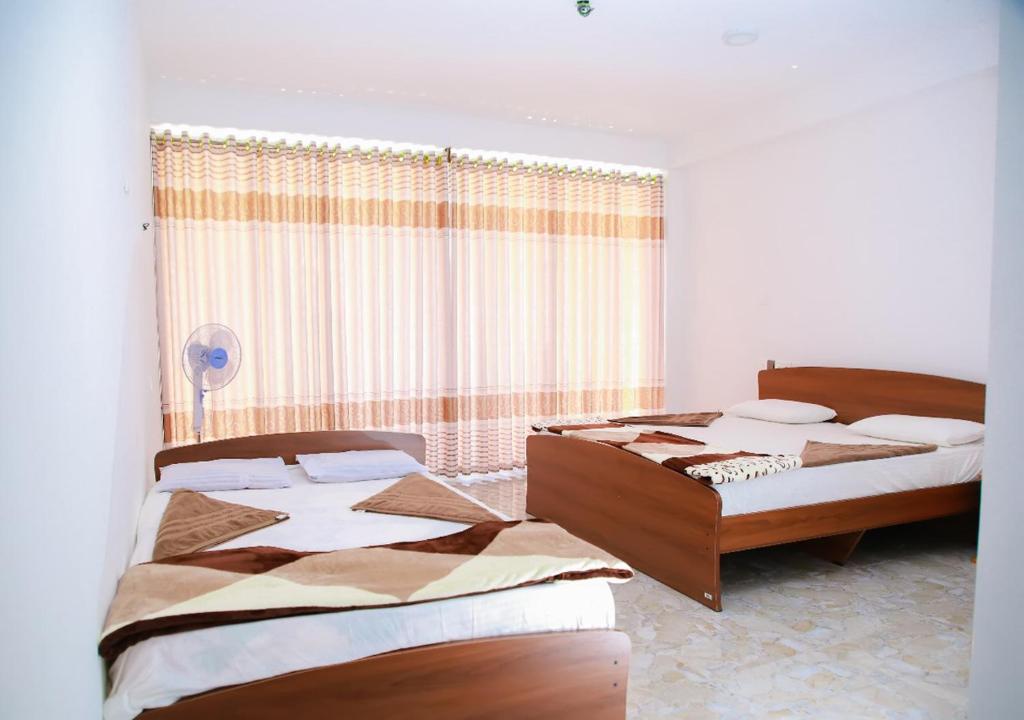 Postel nebo postele na pokoji v ubytování Sunrise view inn