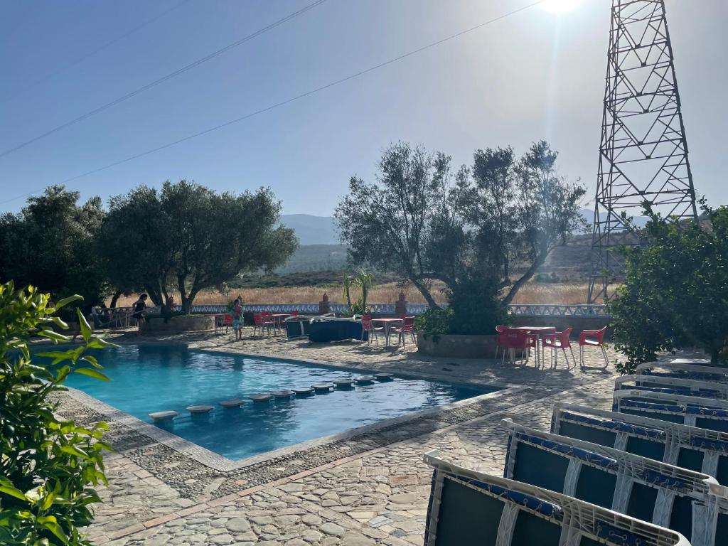 Sundlaugin á Auberge Alwahabi eða í nágrenninu