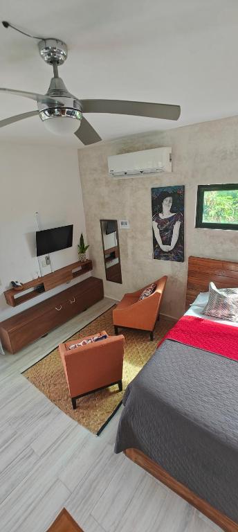 Postel nebo postele na pokoji v ubytování Tu Departamento en Mahahual
