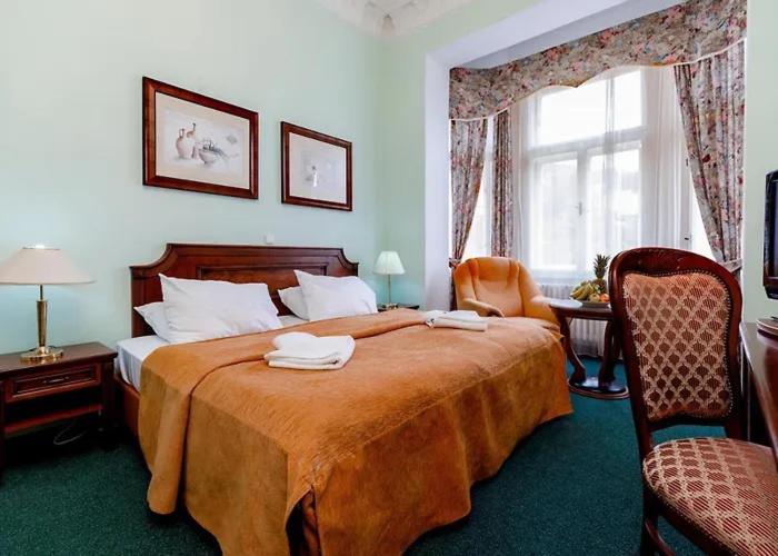 Postel nebo postele na pokoji v ubytování Hotel Ester