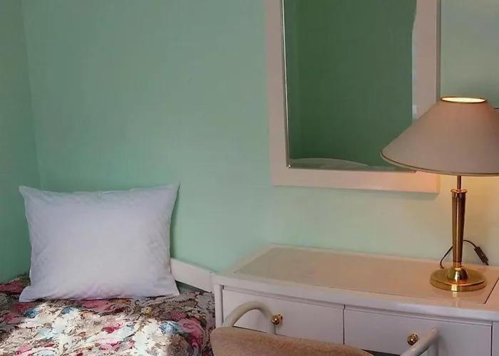 Postel nebo postele na pokoji v ubytování Hotel Ester
