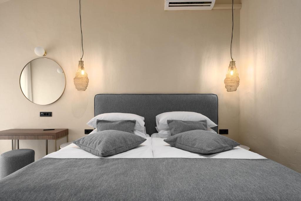Cama o camas de una habitación en Boutique Hotel Paradiso