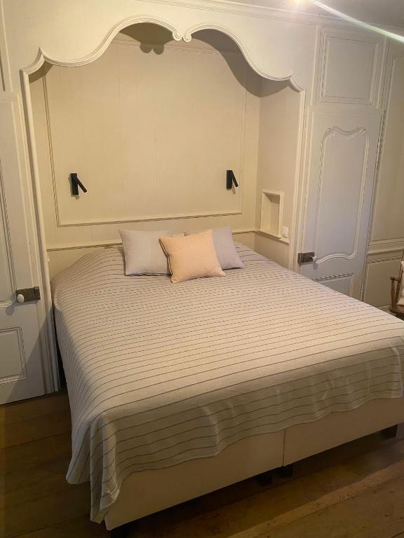 Postel nebo postele na pokoji v ubytování Doeveren