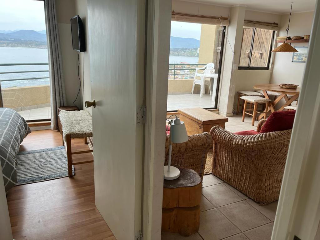 a room with a view of a living room at Horcon Condominio CAUCAU in Horcón
