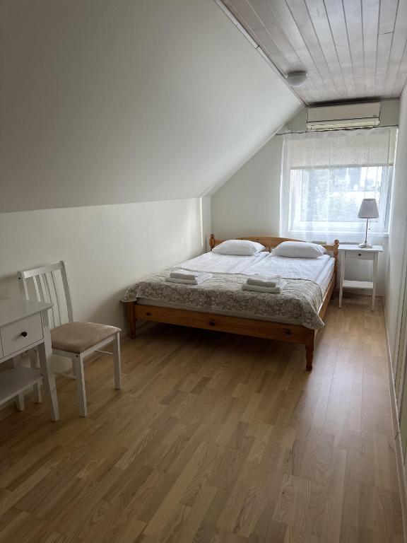 Postel nebo postele na pokoji v ubytování Villa Helena