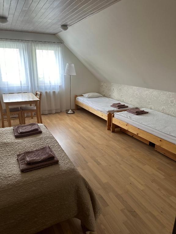 Postel nebo postele na pokoji v ubytování Villa Helena