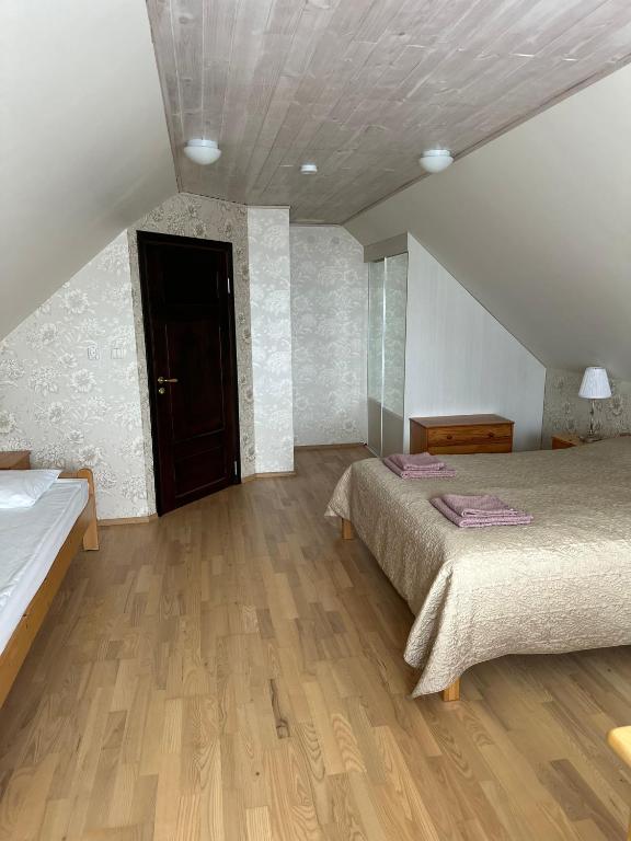 Postel nebo postele na pokoji v ubytování Villa Helena