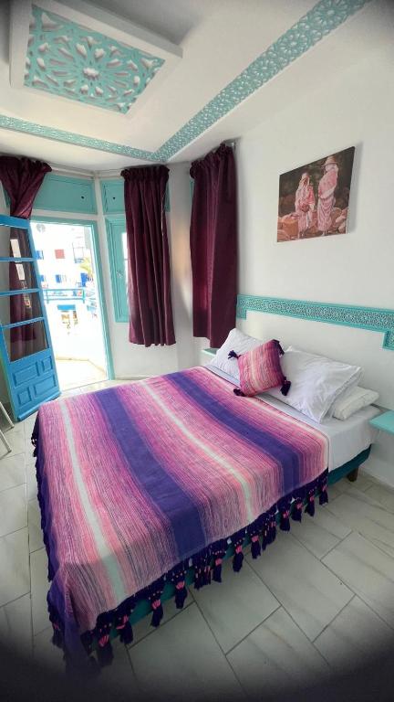 Postel nebo postele na pokoji v ubytování Hôtel Etoile de Mer