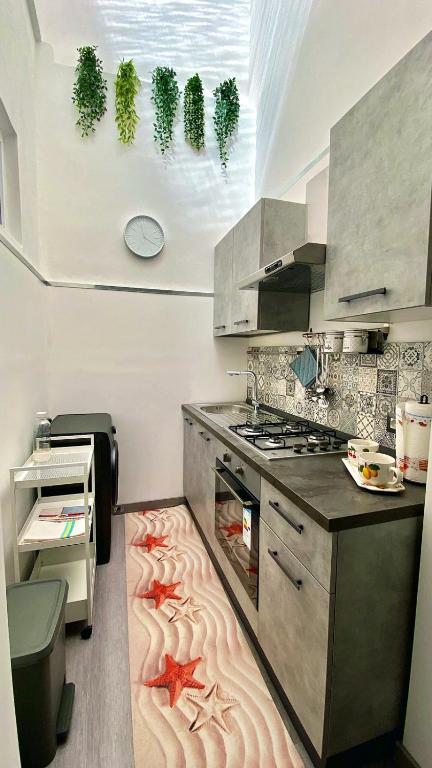 Kuchyň nebo kuchyňský kout v ubytování Sicily Casa Vacanze